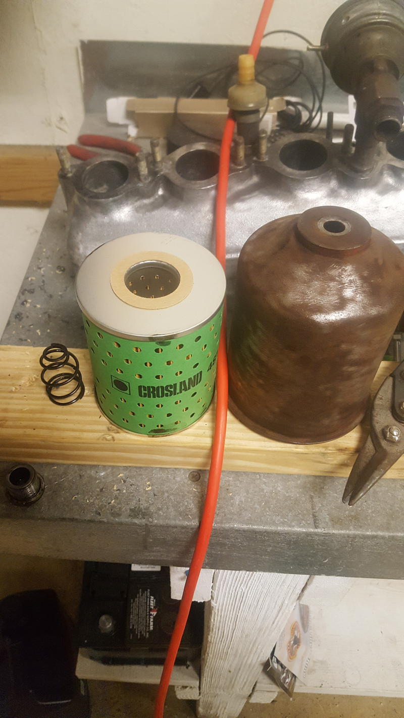 The new filter sitting next to the canister it will live in soon.